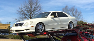 Illustration for article titled How To Build A $1500 Salvage Title S55 AMG To Speed Across The Country